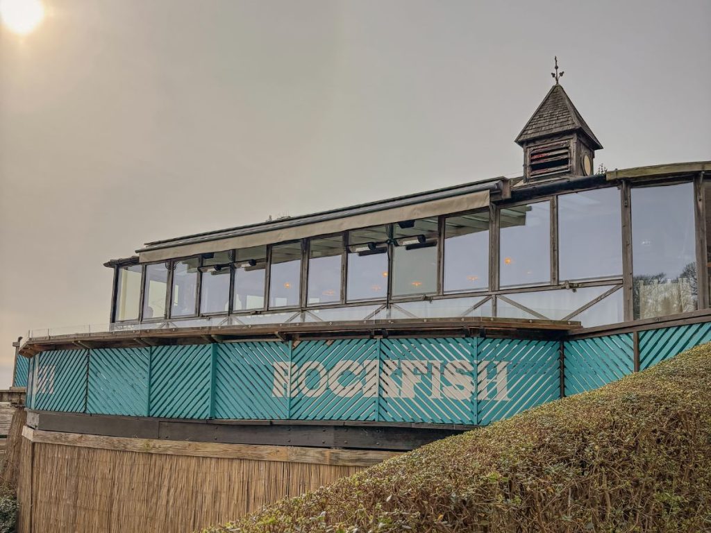 The Rockfish Restaurant overlooking the harbour at Lyme Regis, Dorset