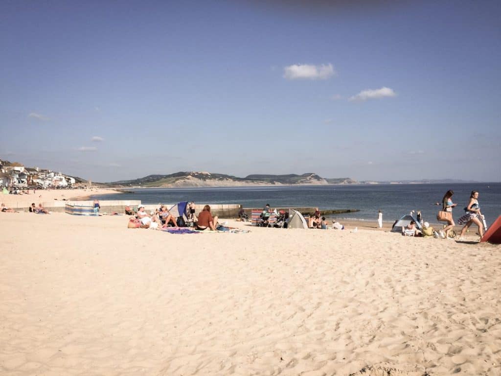 The sandy beach at Lyme Regis on a beautiful sunny day