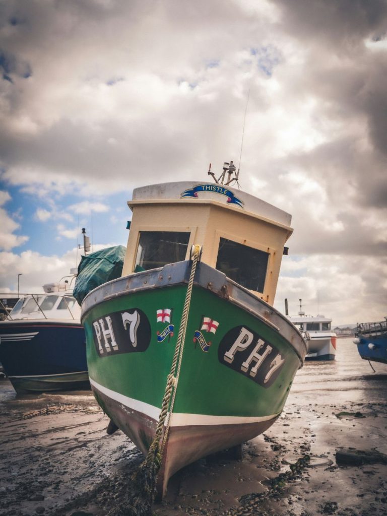 Green boat in the harbour at Minehead, Somerset