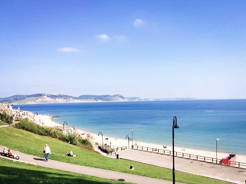 The beautiful blue sea at Lyme Regis on a bright sunny day