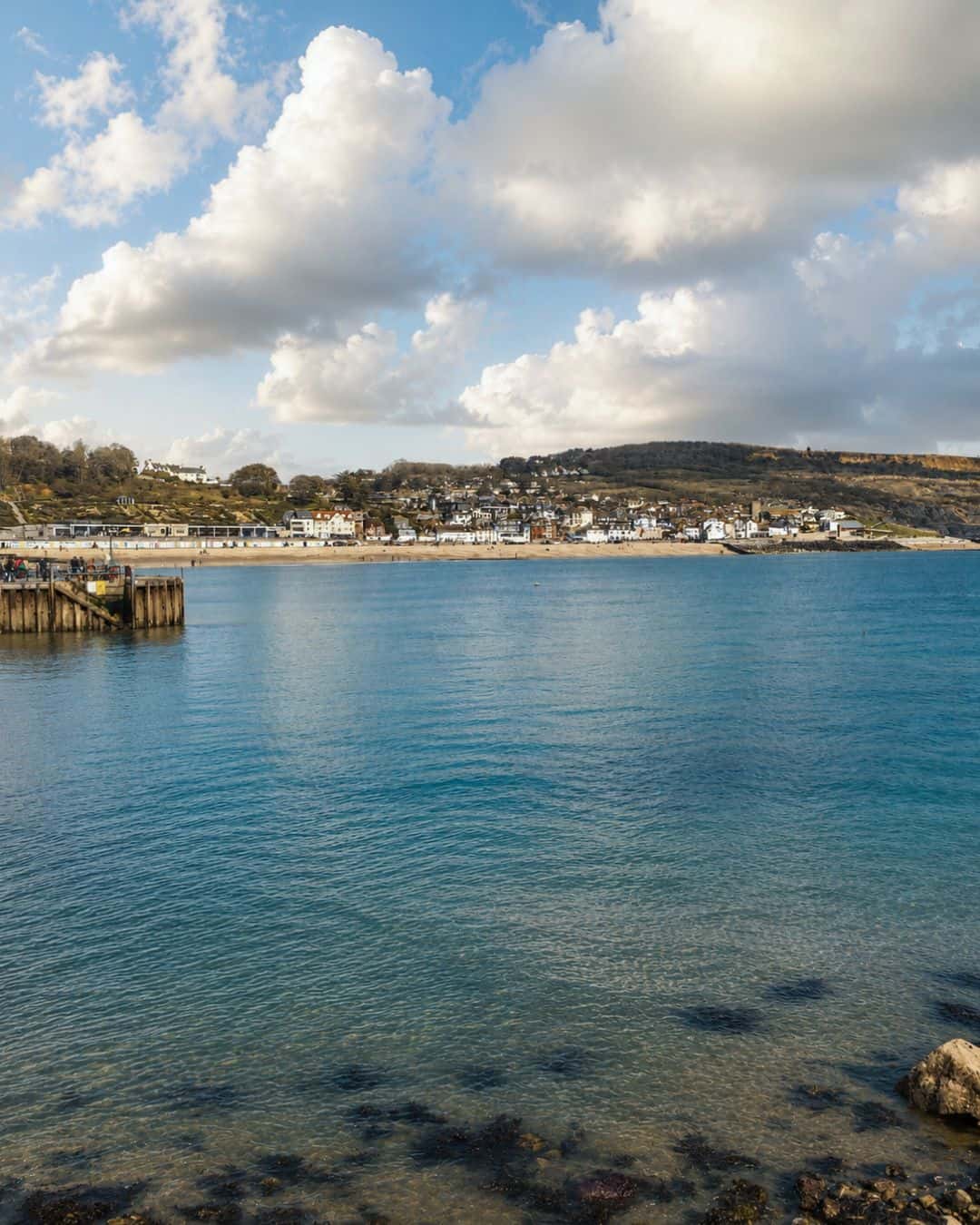 A view from the Cobb in Lyme Regis on a sunny day