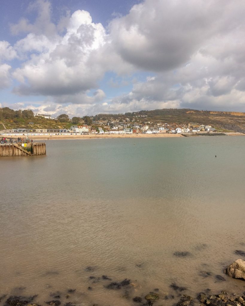 Views looking back over Lyme Regis from the Cobb