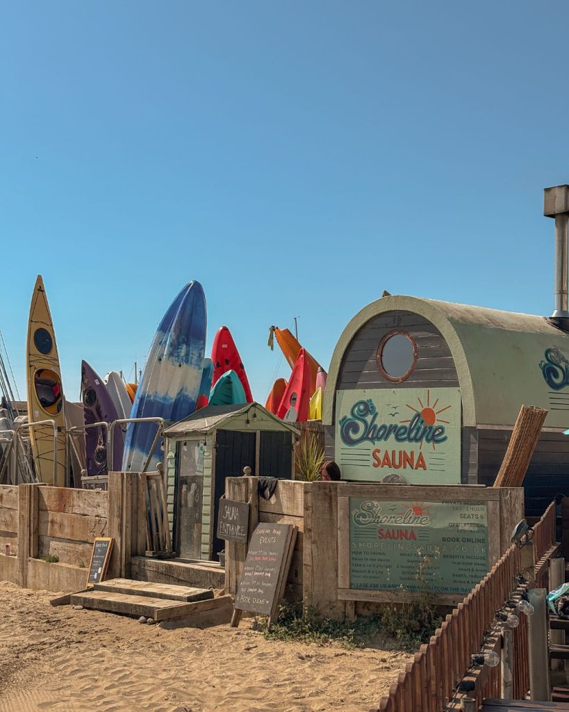 Shoreline sauna at Lyme Regis on a beautiful sunny day