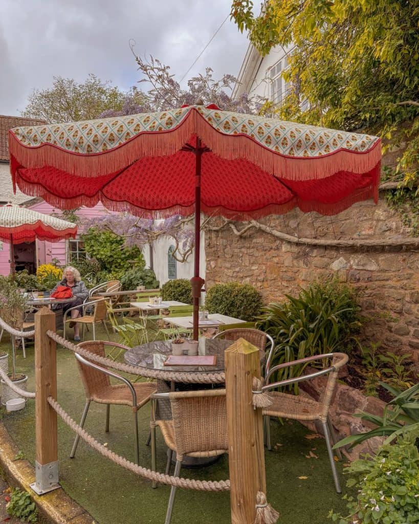The quaint courtyard tea garden at Tessa's Tea Shop in Dunster, Somerset
