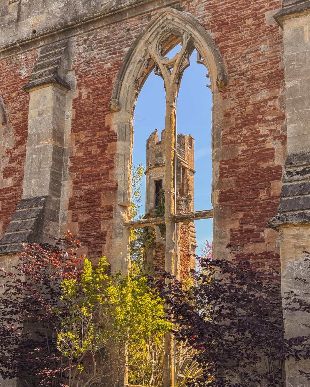 Stunning arch and turret at Bishop's Palace Gardens in Wells, Somerset